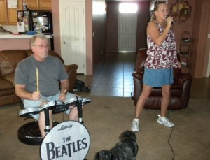 Mom and dad playing RockBand